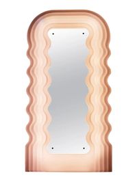 In 1970, Ettore Sottsass had designed this genuinely unique mirror glowing in pink light. Sottsass named it ultrafragola, which means ultimate strawberry, alluding to what women who would see reflected in it. The curvy shape channels the erotic nature of the female form. The wavy, vacuum-formed acrylic sheets and colored neon lights were cutting-edge and thoroughly modern when this piece was designed.