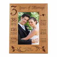 Engraved Anniversary Picture Frame Dimensions: 7.5" x 9.5" Frame holds a 5" x 7" photo Celebrate your special anniversary day with your lover by enjoying LifeSong Milestones Solid Wood Wedding Anniversary Picture Frame. Get this gift as a keepsake to remember your special day you made the ultimate bond. LifeSong Milestones has created the perfect First Anniversary photo frame gift. Wooden picture frames were designed, handcrafted, and engraved in the USA by © 2019 LifeSong Milestones.