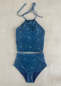 This darling reversible tankini is basically four swimsuits in one because both the top and bottom are fully reversible! The top has an added layer inside with sewn-in padding for worry-free play all day. We tested the fabrics in the salty ocean, sandy beaches, pools, and hot-tubs. It is high-quality, comfortable, and SO much fun!! Truly, a combination you won't want to live (or swim) without ;). High-waisted reversible bottoms High neck reversible top Sewn-in padding High quality fabric Full Coverage * Tops run a bit small. If you are between sizes, we recommend sizing up! Bottoms are true to size. ** Always hand rinse in cold water after use, and lay flat to dry