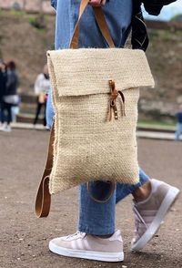 Stylish backpack/tote handmade in Tulum by Native Mayan women. Supporting fair trade values and utilizing natural fibers sourced locally. These gorgeous totes are made from Henequen-a plant native to the Yucatan. The plant is closely related to Sisal and has been used since pre-Columbian times. Accented with cafe leather straps. Handmade in Tulum by Era~A collaboration with Mio & Palmyra Handmade Email for shipping details worldwide / $10.00 will be added for US shipping