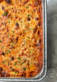 cooked tray of bubbly hot cheesy baked ziti