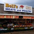 Bell's Meat & Poultry - Kane, PA The Original Griller: Chicken Breast, Virginia Ham, Swiss Cheese and Greek Sausage all rolled up with bacon on the top