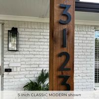 CLASSIC MODERN house numbers have effortless charm and sophisticated curb appeal that will enhance your front door. Available in matte black, white or brushed silver finishes for modern address signs that are easy to read on any color exterior. The 5 inch size is available with screws and standoffs for that floating look or a durable adhesive designed for outdoor use. Spell your number, street or business name with address letters for durable and affordable modern outdoor signs. These numbers have a uniform width making them perfect for vertical house number installations. Made from durable aluminum plastic composite, they'll stand up to any weather.