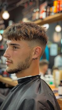 Discover the perfect blend of sophistication and edge with the Edgar With Low Drop Fade, featured in our latest article showcasing 25 updated styles for men in 2024. This contemporary twist on the classic Edgar cut offers a seamless transition from longer hair to a shorter fade, creating a sleek and polished look. Dive into the trend – click the pin and follow us for more grooming inspiration! #LowDropFadeEdgar #MensHairstyles #GroomingTrends #SophisticatedStyle #EdgyLook