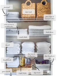 Organized Bathroom Linen Closet Anyone Can Have - Kelley Nan- Elfa door system with medicine storage solution