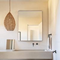 This Rectangle Modern Framed Wall Bathroom Vanity Mirror is a stylish and functional addition to any bathroom. Measuring 23.5 inches in width and 30 inches in height, it is the perfect size for daily grooming tasks. The mirror is encased in a modern, sleek frame that adds a touch of elegance to your bathroom decor. It can be hung vertically or horizontally, making it a versatile piece that can adapt to your specific design needs. The high-quality glass provides a clear, distortion-free reflection, ensuring you always look your best. Easy to install, this vanity mirror is a must-have for any contemporary bathroom. It not only enhances the aesthetics of your space but also adds depth and dimension, making your bathroom appear larger and more inviting.