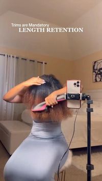 TikTok doll: j_mela Learn an easy method to trim your natural hair and get rid of split ends to retain length | natural hairstyles for black women | trimming tutorial | protective styles | trim natural hair | length retention | curly hair tutorial | natural hair blow dry routine | easy protective styles | natural hair care | hair care routine | winter hair care | split ends on natural hair