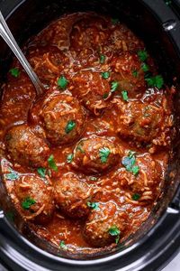 Slow Cooker Italian Sausage Meatballs - A dreamy and hearty, comfort-style slow cooker recipe that's too good NOT to be on rotation!