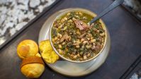 Experience the magic of slow-cooked black-eyed peas and collard greens. A Southern tradition packed with history and love.