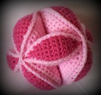 Amish Puzzle Ball--11 Crochet Amish Puzzle Ball Pattern. Okay, so it's for babies, but I so think I would have fun with this! And, it would be a unique gift.