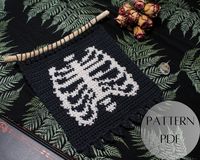 This listing is for a digital crochet pattern from Farfy's YarnCraft. This listing is for the digital crochet pattern only, not the finished wall hanging. The digital crochet pattern consists of a total of 10 pages including the front and back cover pages. Skeletal Ribcage Tapestry Wall Hanging with cross stitch embroidery would make the perfect gift for the lover of darkness, who appreciates the macabre in all its magnificence. This wall hanging decor will be the perfect piece to add a little s