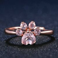 Pink Paw Rose Quartz Ring 【Main Stone】: 5x5.5mm 100% Natural Pink Rose Quartz  【Meterial】:925 Sterling Silver  【Plating】:Rose Gold Plated / White Gold Plated  【Occasions】: Party/Wedding/Gift/Daily/Anniversary/Dating