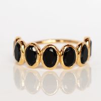 The Violeta Black Onyx Ring has feeling of dark romance with five sparkling black onyx gems set in 14k yellow gold vermeil. Shop more black stone rings as Local Eclectic.