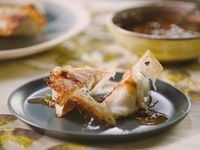 Get Pork Dumplings with Crispy Skirt Recipe from Food Network