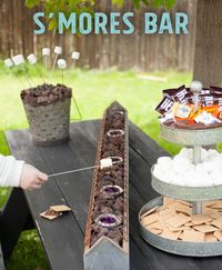 Perfect Summer DIY for a S'mores bar on your backyard table! This is the perfect summer party show-stopper and the tabletop roasting is safer for little kids, than a fire pit. #capturingtheseason #smores #storytelling