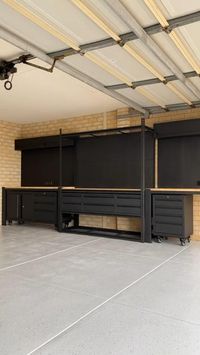 Transform your messy garage into a modern haven! This remodel creates a dream workshop with sleek cabinets, tool organization [tool cabinets], and stylish hardware [cabinet hardware]. Perfect for small garages , maximize space and functionality. Get inspired for your own garage makeover! #moderngarage #garageremodel #garageworkshop #finishedgarage #garageideas #smallgarageorganization #garagecabinets #toolcabinets #cabinethardware #diy #dreamgarage