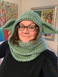 Thank you for checking out this crochet pattern for an alien hooded scarf. This is my first pattern. I'm so happy to announce that I have revised the original pattern in September 2023 with updated pictures and instructions.  If you bought the pattern prior to this date, send me your email address with a copy of your receipt and I will email the updated instructions. If you have any questions about the pattern or custom order requests, feel free to message me.