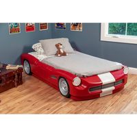 Your little ones will cruise to Dreamland in style with this Toddler to Twin kids bed. Mini car enthusiasts will love the details and styling made to look like the real thing! This children’s car bed will make sleep transitions fun – move from their crib to the sleek toddler Roadster bed, and when they are ready, add the front and side panels to expand to a twin bed. With the Step2 Roadster Toddler-to-Twin Bed, bedtime becomes a treat rather than a chore. Made in the USA of US and imported parts