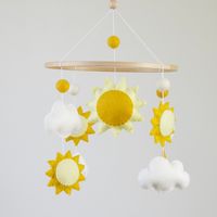 ☁️ Felt baby mobile with suns and hearts. This mobile is handmade and made with high quality wool felt. Lovely decor for your baby's nursery! Perfect gift for a baby shower or newborn present. ☁️ Ring diameter approx 20 cm  Full length ~ 35-40 cm. Baby mobile includes: 1 big sun 4 small suns 9 balls  4 clouds The price of the mobile includes 1 base with characters. This listing does not include the holder or music box.  Mobiles are for decoration! It is not a toy! Mobiles should be securely hang