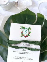 Bring paradise to your special day with this hand-painted watercolor wedding crest! Featuring lush palm trees and vibrant tropical flowers surrounding your customizable initials, this design adds a touch of exotic elegance to your celebration. The soft, dreamy watercolor style perfectly captures the romance of a destination wedding.

Versatile and unique, this crest is ideal for invitations, save the dates, thank you cards, menus, and welcome signs.

Whether you're tying the knot on a beautiful beach or just want to infuse your big day with island vibes, this crest sets the perfect tone.