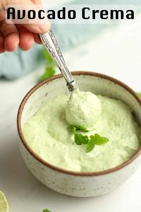 Use this Avocado Crema on all of your Tex-Mex dishes. Combine a ripe avocado with sour cream, cilantro, garlic salt, and freshly squeezed lime juice - and enjoy the best topping for SO many things!