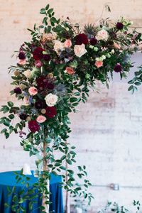 Fall Organic Floral Altar   | Photo & Video: Tyler + Lindsey | Accommodations: The Statler | Alterations: Altered for the Altar | Bridesmaid Attire: Bella Bridesmaids | Calligraphy: Bethany's Letter Shop| Venue: Brake & Clutch Warehouse|  Planner: Lindsey Zamora Events |  #bridesofnorthtx #txbride #dfwwedding #weddinginspo #weddinginspiration #fallwedding #autumnwedding #organic #industrialwedding #floral #floralaltar