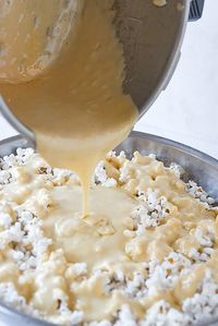 Marshmallow Popcorn is ooey, gooey and utterly delicious! It's slightly addictive and if you are not careful, you will eat the whole bowl!