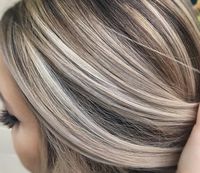 Cool ash blonde against a neutral brown