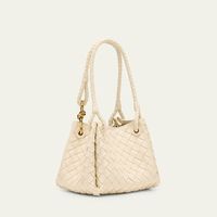 Bottega Veneta "Adiamo" parachute top handle bag in intrecciato leather�  Shoulder straps with metal knot hardware  Open top with magnetic closure  Approx. 6.5"H x 8.3"W x 6.7"D Made in Italy