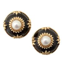 Very large, stylized flower motif earrings made of gold, enamel and a central pearl. They are a set with item JU120528133322 but are being offered separately. The earrings measure 1 1/8" in diameter. Backs are clips.