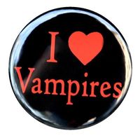 I Love Vampires This listing is for 1 button (pinback). You will receive the button pictured in the main photo and listed in the title. The button measures 1 1/2 inches across and is brand new. Any glare on the button is just from the picture. The one you will receive will be perfect. This button is also available as a flatback, magnet or a keychain. The last photo is for size reference only. Quantity discounts are available.