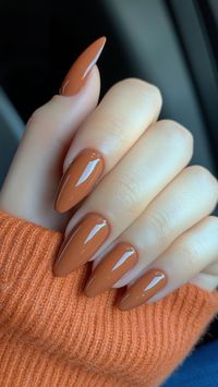 Terracotta Nails offer a warm, earthy tone that’s perfect for embracing autumn’s cozy vibes! This stylish shade will make your fall look effortlessly chic. Click the pin and follow us for more autumn nail inspiration! #FallNails #TerracottaNails #AutumnStyle #OrangeNails #NailInspo