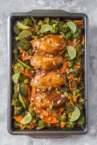 Skip the take out and make this easy Sheet Pan Thai Peanut Chicken as a weeknight dinner or as a meal prep for the week!