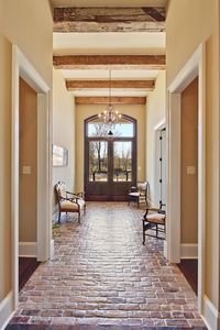 beautiful entance & hallway, brick floor ~  Troyer Builders