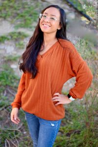 What do you get when cozy, comfort and cute collide? The Eden Dolman Sweater! This relaxed fit sweater is perfect to wear on its own or layered over a tank or cami anytime comfort is paramount! With three different styles, such as the simple V-neck, cross over bodice or faux button placket (no buttonholes required!) yo