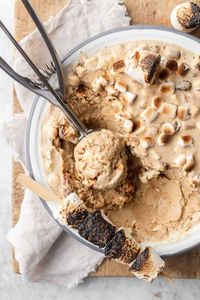 Relive your Summer camp days with this Toasted Marshmallow Ice Cream. With charred marshmallows in a custard base ice cream, the flavours are rich, deep and nostalgic. The toasted marshmallow bits will take you right back to fun around the campfire. Recipe By Emma Duckworth Bakes.