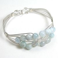 Wire and gemstone combination bracelet design.