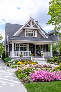 Modern cottage in pastel yellow siding stone grey multi pitched roof large windows with white trim and mouldings v 6.1. Stay ahead of the curve and make your neighbors green with envy by uncovering the latest, eye-popping house exterior trends.