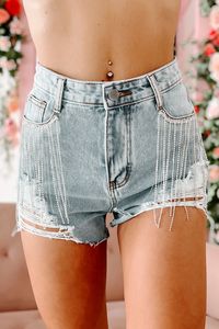 Look Absolutely Fabulous In These Light, Distressed Denim Shorts Featuring A Flashy, Rhinestone Fringe Pocket Design! $41, FAST AND FREE US SHIPPING!