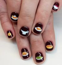 Get in the Turkey Day spirit with these creative Thanksgiving nail designs featuring everything from pumpkin pie to fall colors.