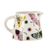 This new Moth Milk Jug by Hannah Turner is decorated with beautiful hand-drawn moths in luscious colours, and is the perfect size for milk at the breakfast table, or for afternoon tea, keep the milk carton for the fridge!  The Moth tableware collection offers a wide range of contemporary but retro feel designs. It comes beautifully gift-boxed gift, and makes a great wedding or birthday gift for any dog lover.  Handmade in Sri Lanka from high-fired stoneware ceramic. Dishwasher and microwave proo