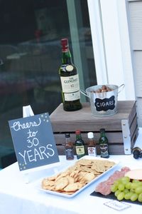 The perfect 30th birthday for a man with whiskey and cigars. - Whiskey And Cigar 30th Birthday Party by popular Los Angeles lifestyle blogger The Fashionista Momma