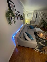 Oak board Couch console with speed charger outlet and LED smart light.