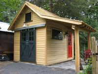 Millers outbuilding - A great selection of design ideas for potting sheds. Lots of inspiration here for the DIY enthusiast. The one pictured has at least 2 good ideas I like: a covered entry and a sliding barn-style door for equipment like a wheelbarrow or garden wagon.