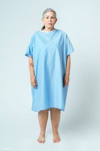 Sad senior patient in a hospital gown | premium image by rawpixel.com / McKinsey