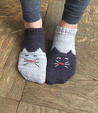 These are two-toned, toe-up ankle socks with a kitty chart on the toe and foot. They feature a simple short-row heel. They can be made Yin and Yang style with contrasting colors or two-of-a-kind. This is my first foray into design and I had a lot of fun. Feel free to contact me with any issues!