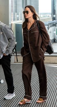 Angelina Jolie in silk pajamas at the airport