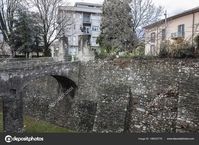 Historic center city view, ancient medieval walls in Lecco, Italy.