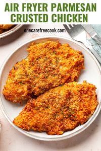 Air fryer parmesan crusted chicken is an easy dinner ready in 20 minutes. Makes for tender and juicy chicken breasts with crispy golden crusts and a 'deep-fried' taste. No oil needed!