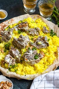 Mansaf is a traditional Jordanian meal made of lamb and rice, seasoned with a unique yogurt sauce. For an authentic taste of Jordan, this recipe is a must-try!